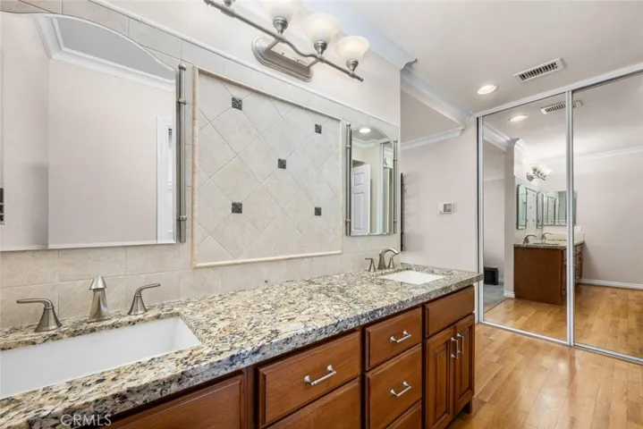Primary bathroom with double vanity.