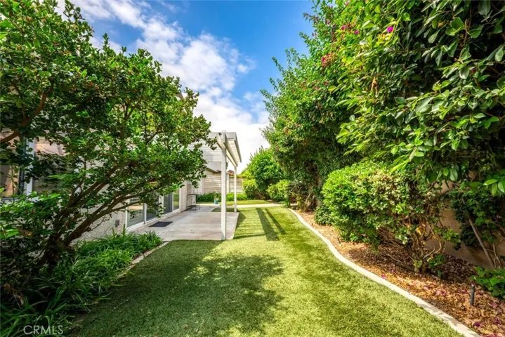 Turfed yard for easy maintenance.
