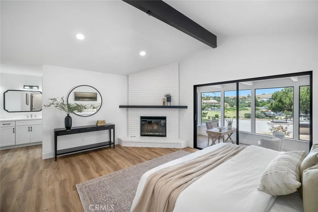 Primary Bedroom with Sliding Door Access to Sunroom/Bonus Room