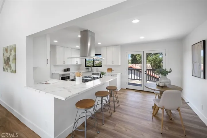 Kitchen with Counter Seating and Breakfast Nook