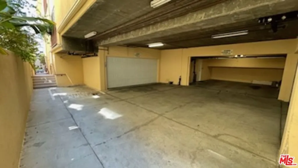 Gated & Covered 2 Car Garage.