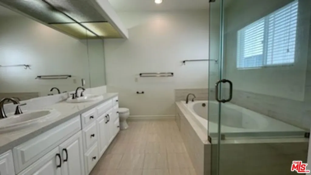 Bright & Roomy Primary Bathroo