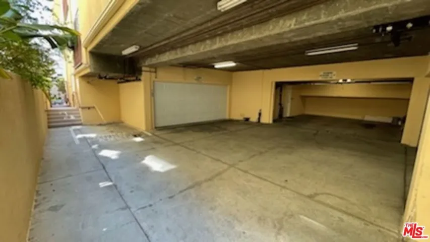 Gated & Covered 2 Car Garage.