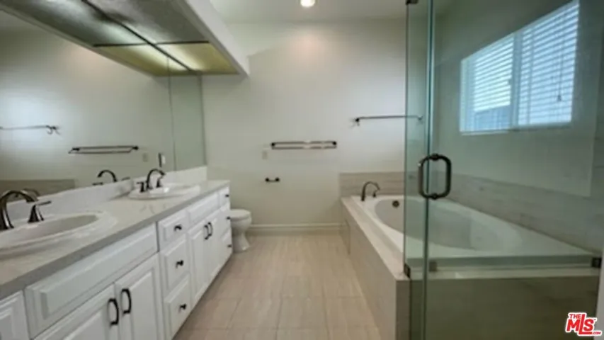 Bright & Roomy Primary Bathroo