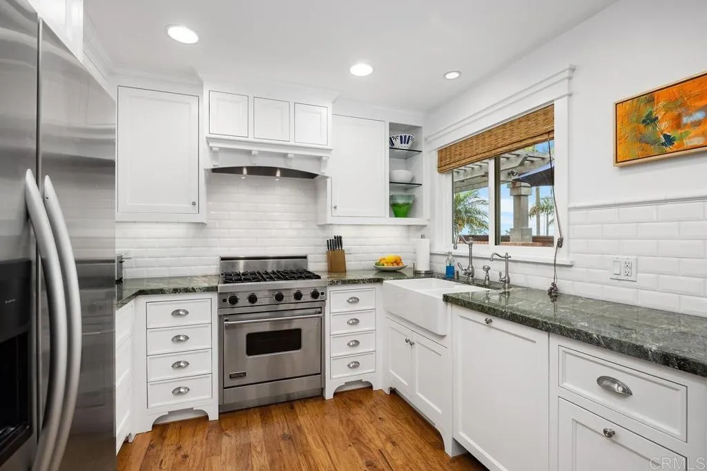 Enviable Chef's kitchen including wine fridge