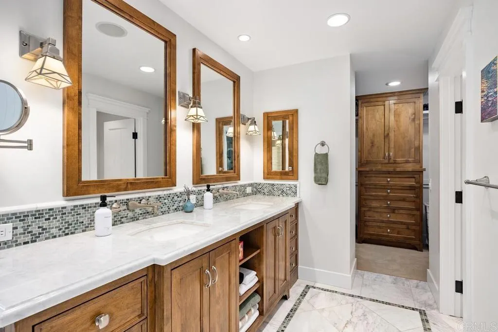 Dual sinks in lavish primary bathroom