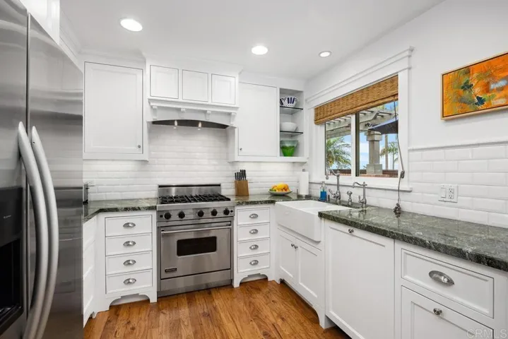 Enviable Chef's kitchen including wine fridge
