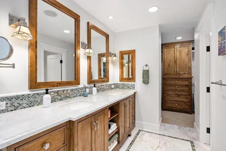 Dual sinks in lavish primary bathroom