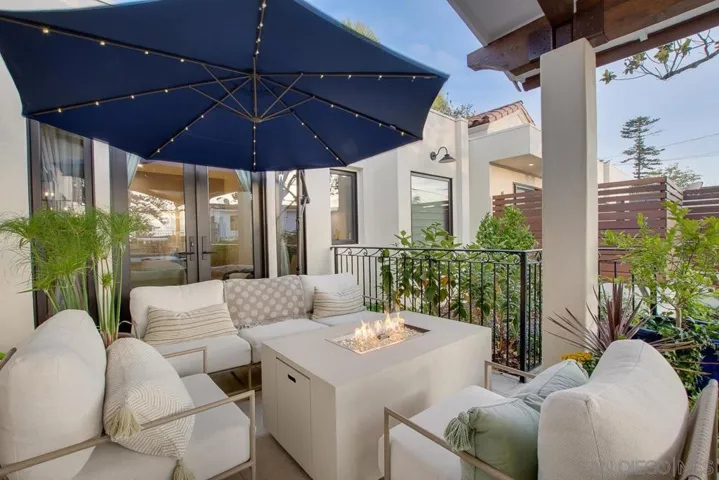 Private patio off primary bedroom.