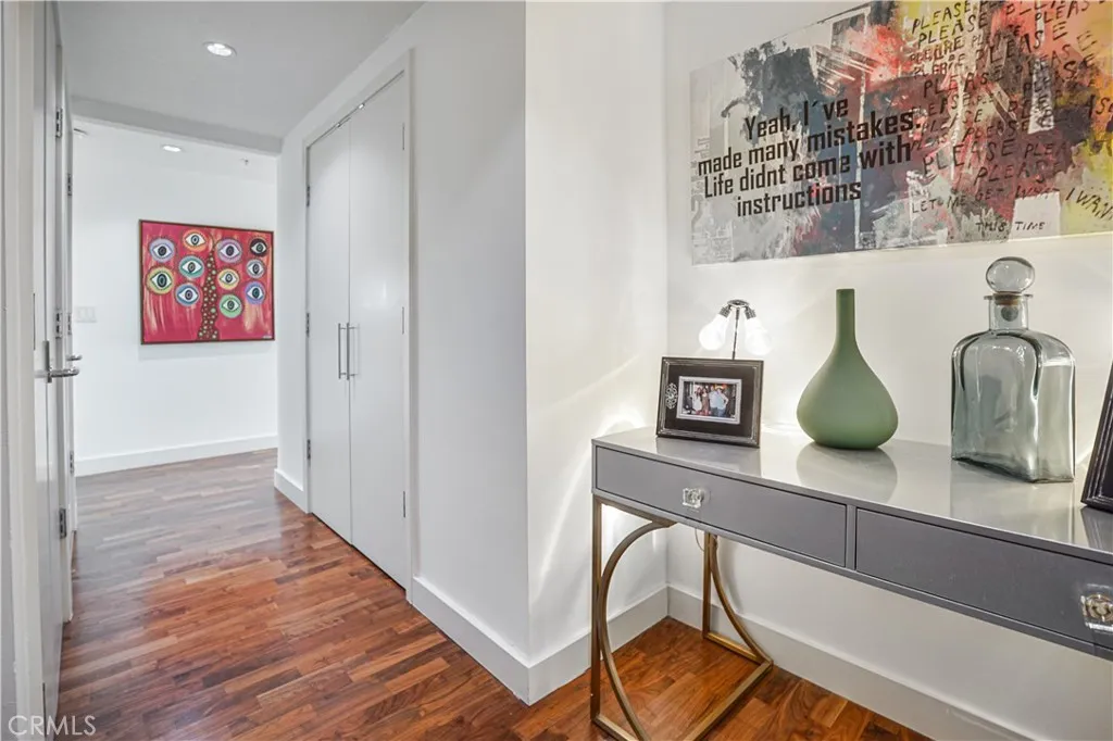 Foyer area with story and laundry
