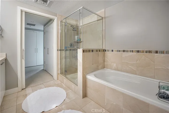 Primary bathroom with separate shower and soaking tub