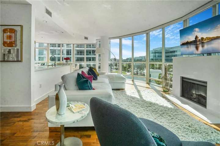 Another view of living room with fireplace