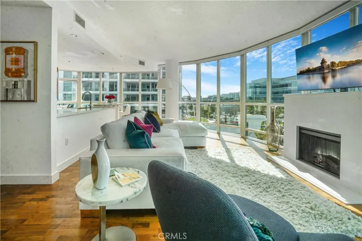 Another view of living room with fireplace