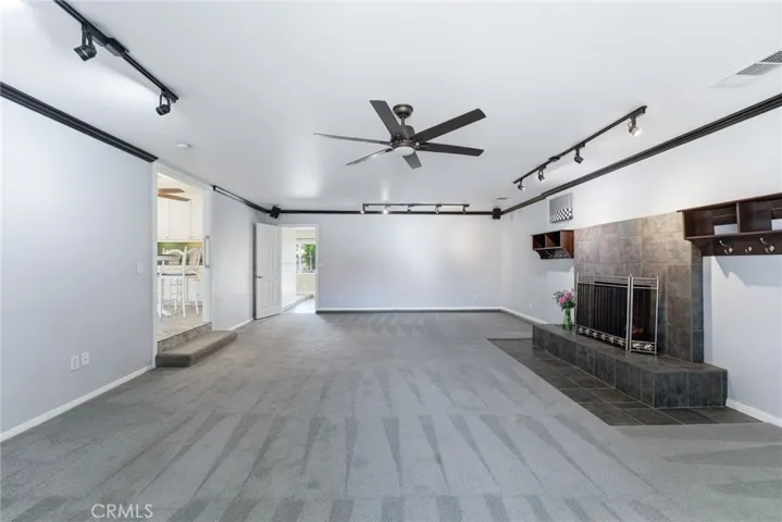 Family Room, Gas/Wood burning fireplace, track lighting