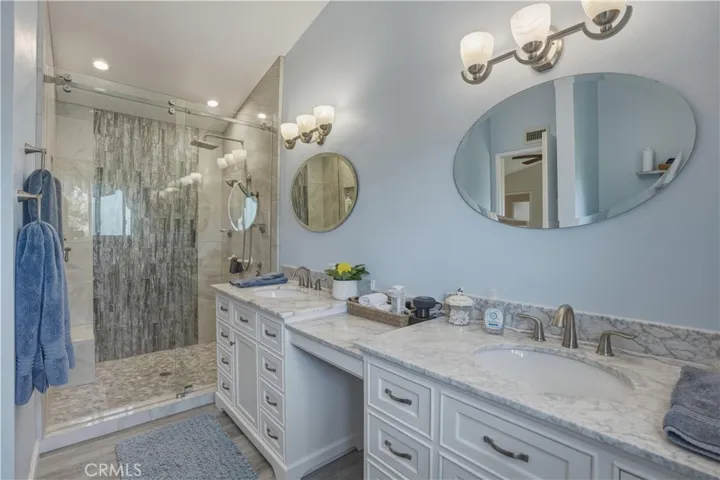 Remodeled primary bathroom with dual sinks