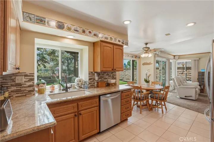 Kitchen opens to eating area and family room