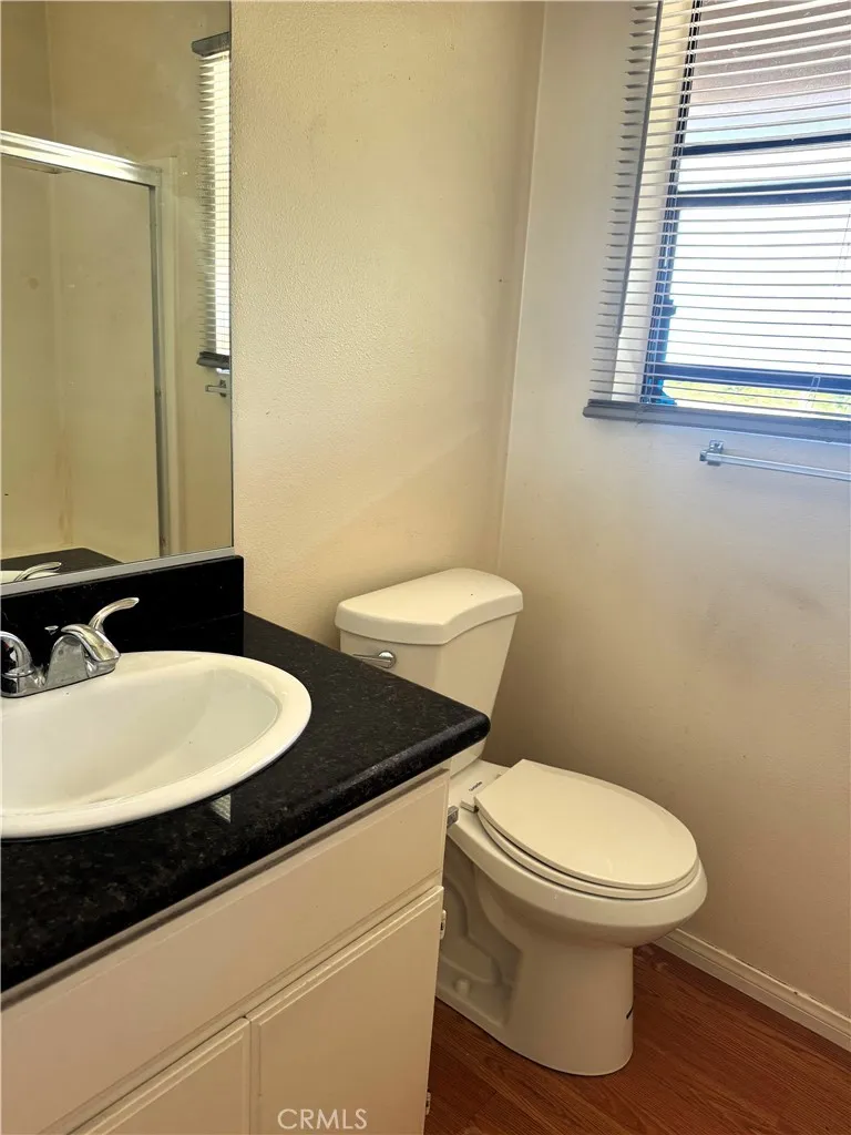Enclosed shower and toilet