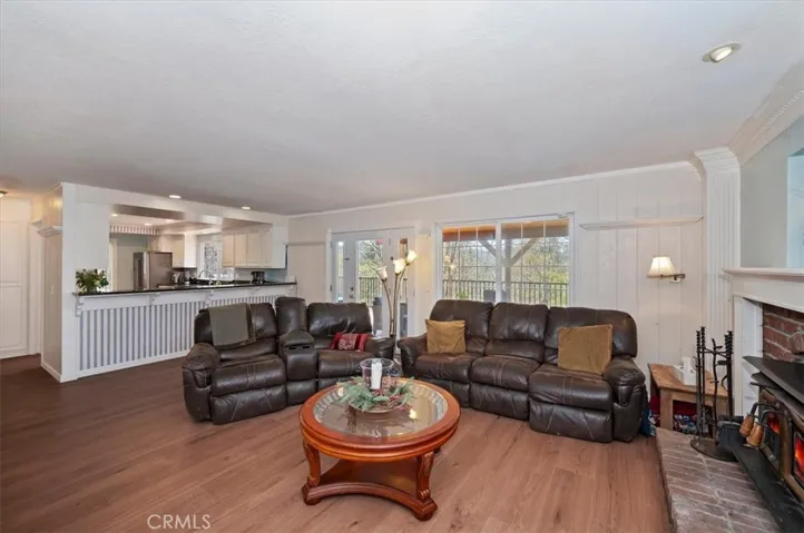 Family room with wood burning fireplace