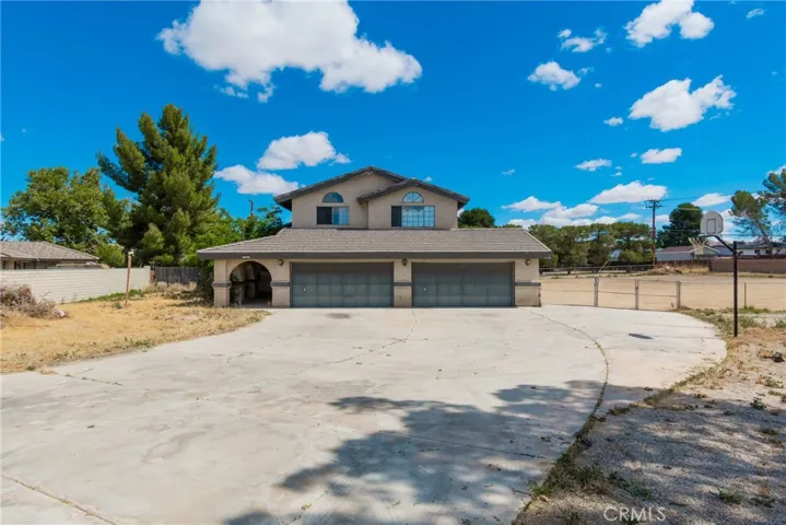 Spacious 4 bedroom home plus an office that could double as a downstairs guest bedroom, with a bath adjacent.
And a basketball hoop in the front!