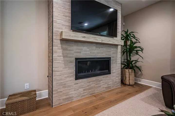 GORGEOUS STACKED STONE GAS FIREPLACE