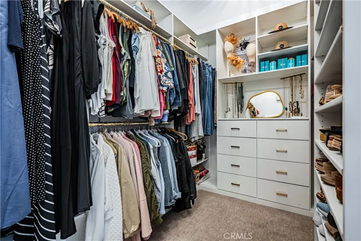 CUSTOM DESIGNED PRIMARY CLOSET