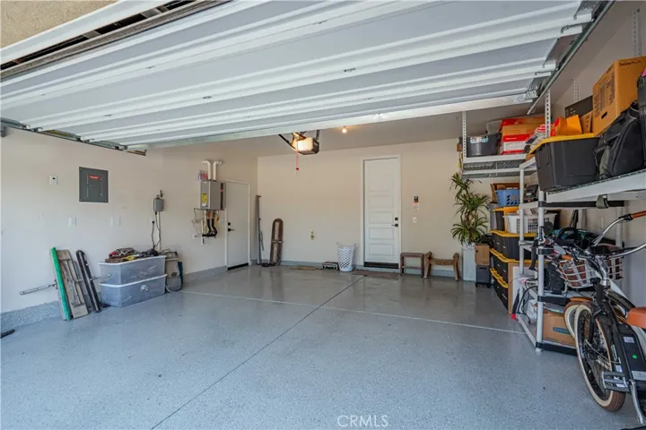 IMMACULATE GARAGE WITH OVERHEAD STORAGE