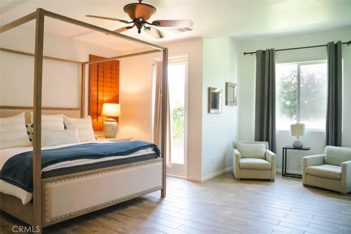 Large primary bedroom with sitting area