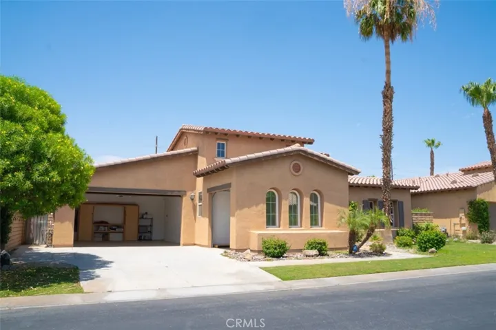Front view with 3 car garage