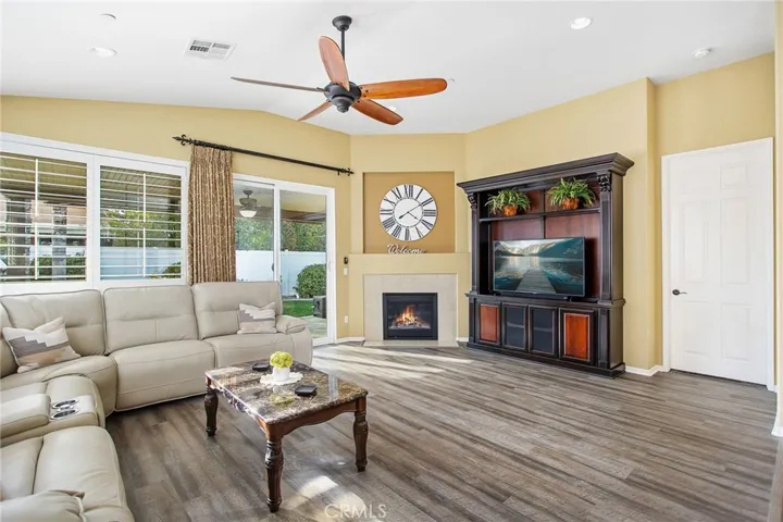 Family room w/fireplace and built-in media center.