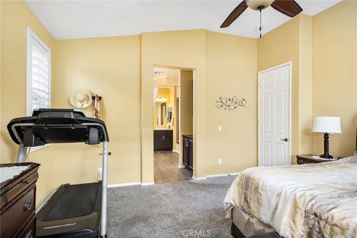 Master bedroom w/vaulted ceiling.