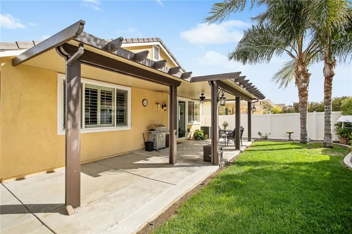 Covered patio a w/nice yard to enjoy.