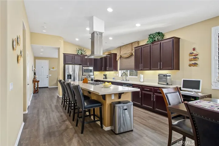 Nice kitchen w/lots of counter space, a large island, and breakfast bar seating.