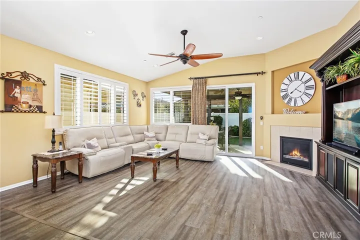 Family room w/fireplace and built-in media center.