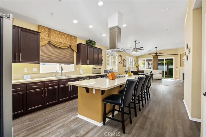 Nice kitchen w/lots of counter space, a large island, and breakfast bar seating.