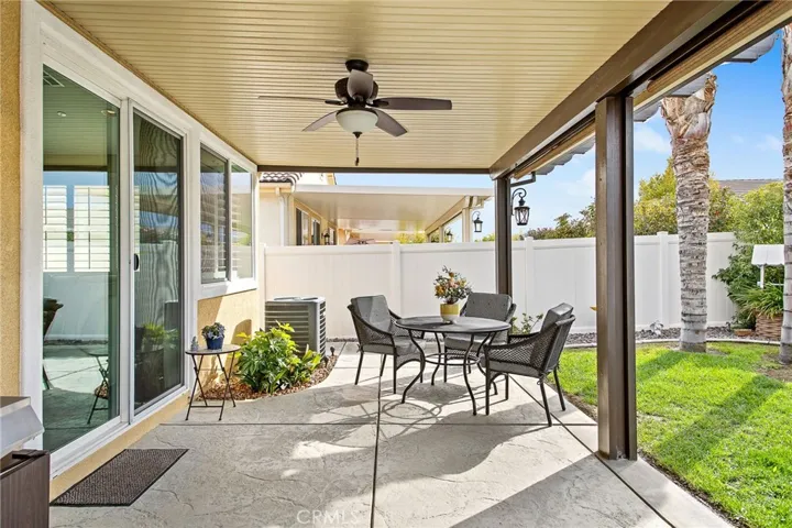 Covered patio a w/nice yard to enjoy.
