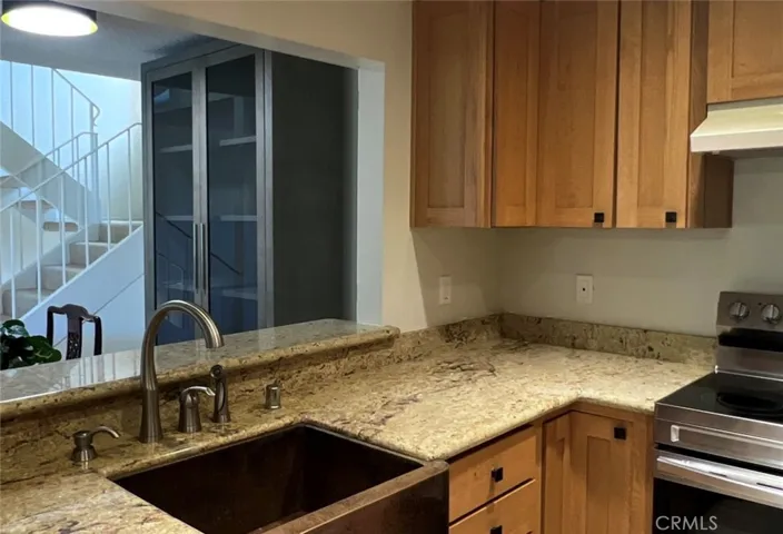 Deep hammered copper sink with open window