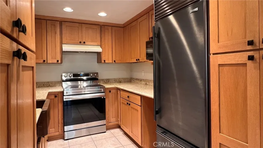 Custom cabinets with roll out shelves, lazy susan corners and organized drawers