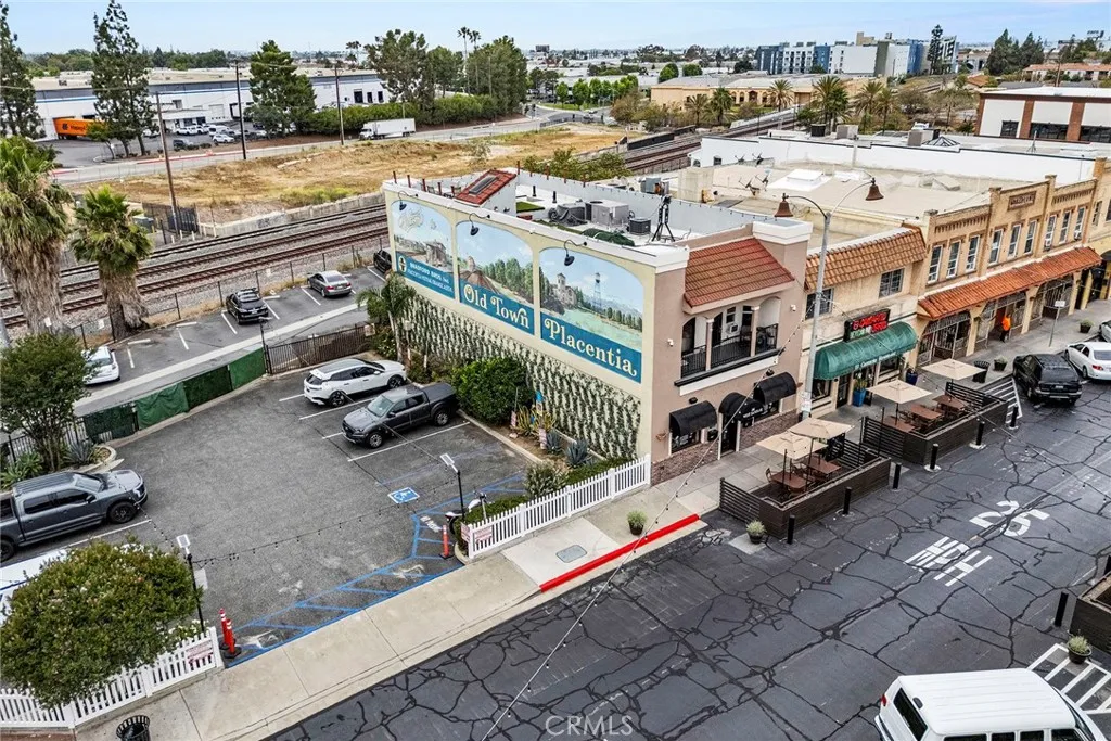 The Parking lot is NOT part of this property...ample parking behind this building.