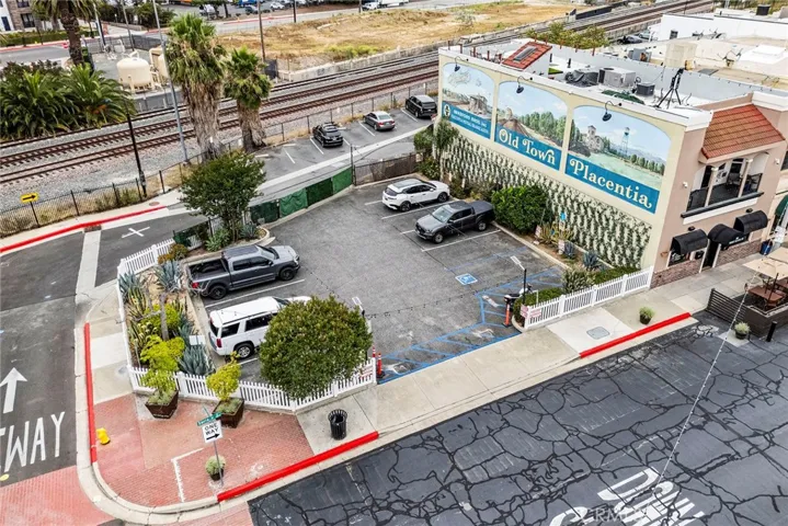 The Parking lot is NOT part of this property...ample parking behind this building.