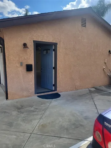 Entrance and parking spot