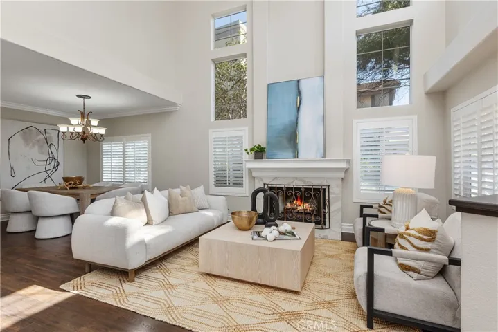 Living Room & Dining Room with high ceilings & natural light