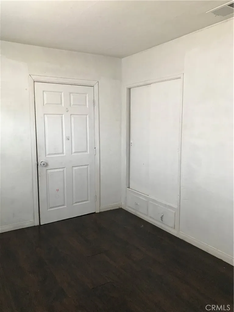 This door leads to the unpermitted space.