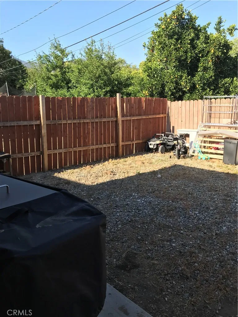 Behind the garage.