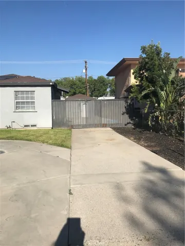 The other driveway on the other side of the house.