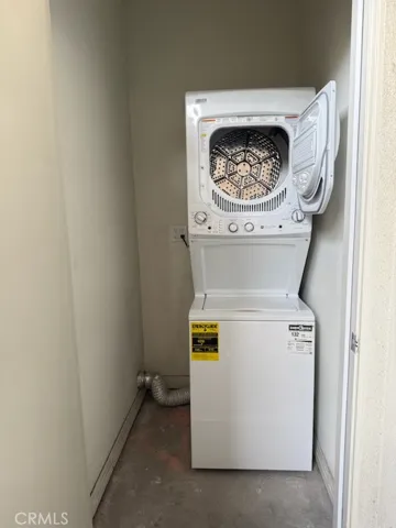 Stacked washer & dryer included (Laundry Closet on Living Room Balcony)