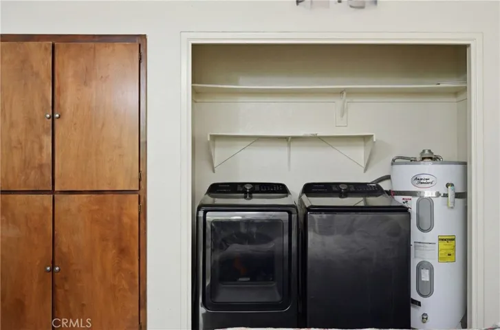 Laundry closet in bonus area.