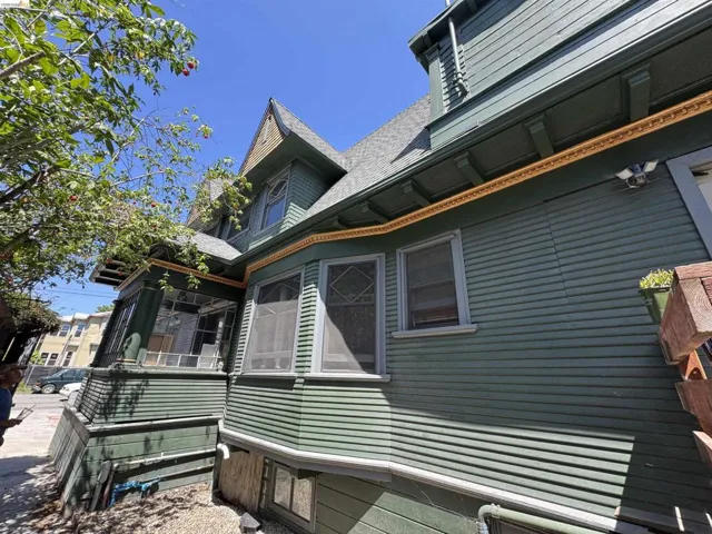 Victorian-style architecture featuring horizontal siding and decorative trim