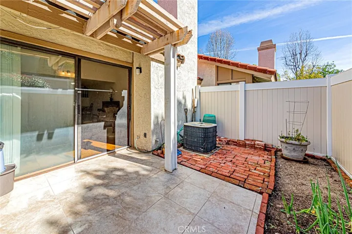 Generous patio space designed for easy upkeep