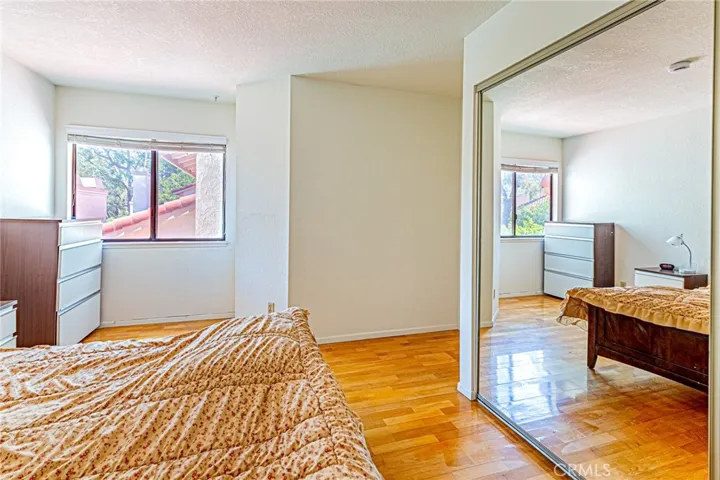 Spacious second bedroom with window and view