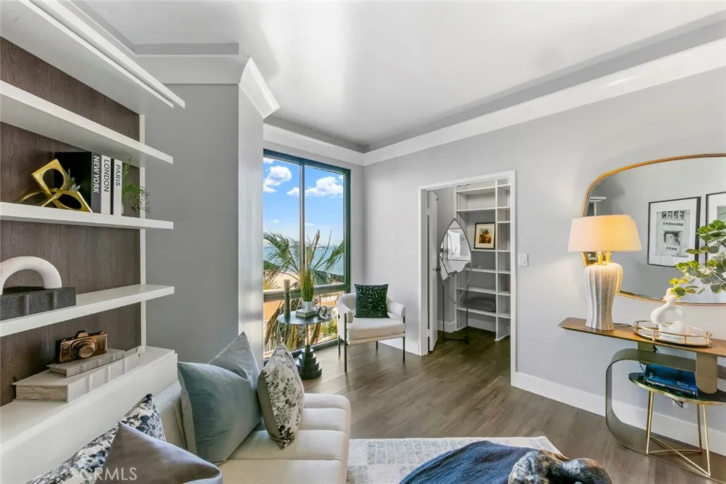 FLEX room with built-in Murphy Bed that could be a display showcase, desk or bed with views to Newport Beach and a walk-in closet. Bathroom adjacent could be made ensuite.